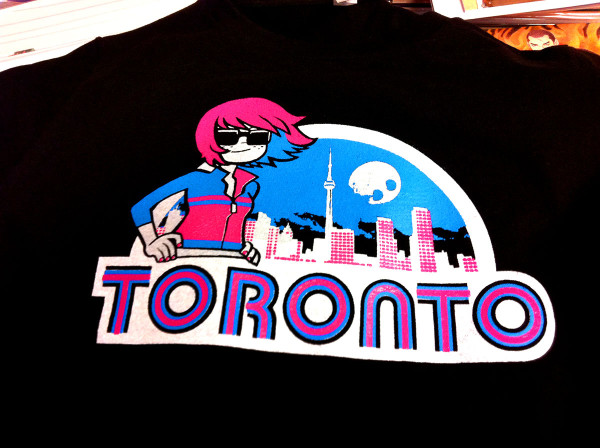 TORONTO T-Shirt, featuring Kim Pine from the Scott Pilgrim series, now in stock. Mens' and Womens' sizes, $20, Beguiling exclusive.